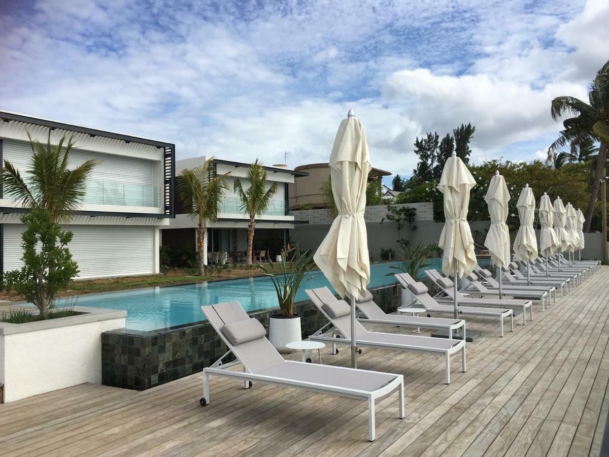 Obiches Luxury Beachfront Apartment Trou-Aux-Biches Bagian luar foto
