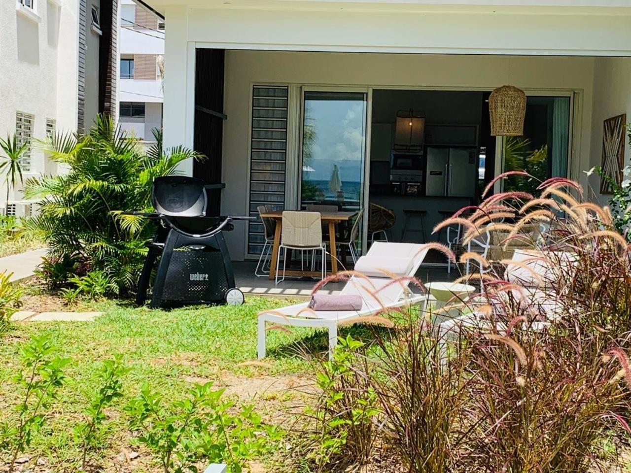 Obiches Luxury Beachfront Apartment Trou-Aux-Biches Bagian luar foto