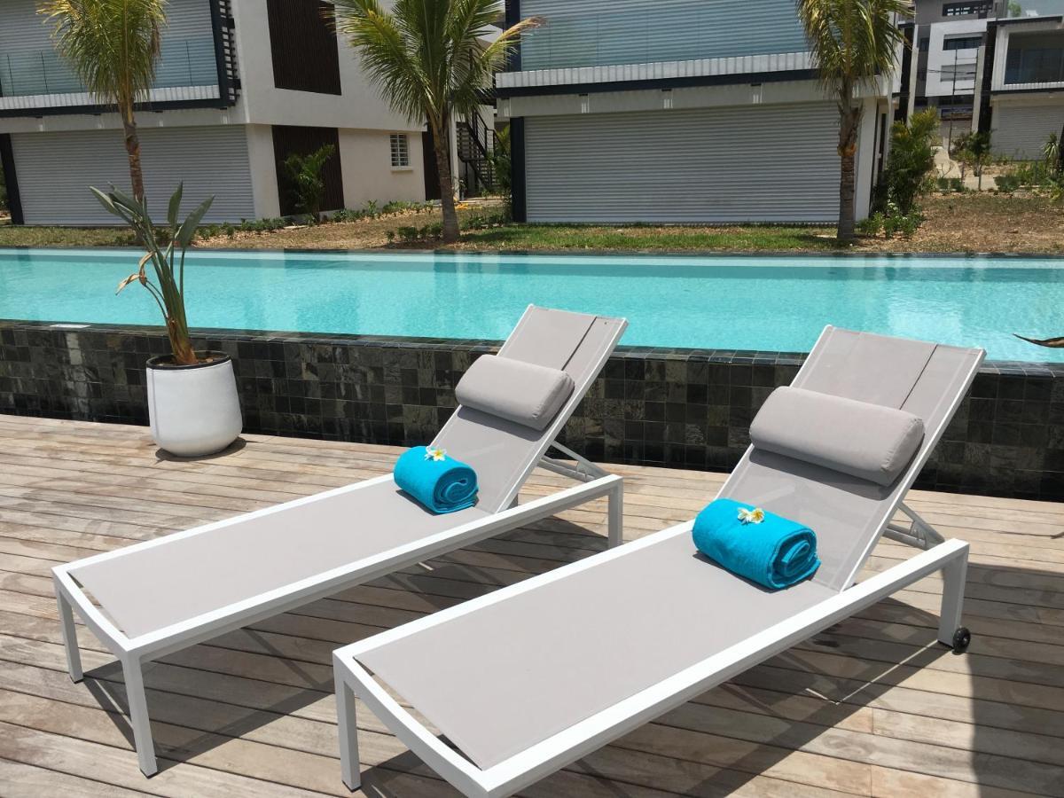 Obiches Luxury Beachfront Apartment Trou-Aux-Biches Bagian luar foto