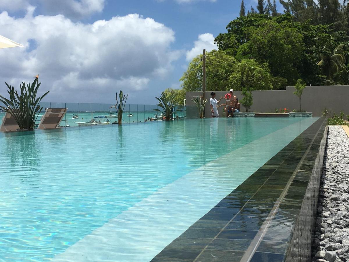 Obiches Luxury Beachfront Apartment Trou-Aux-Biches Bagian luar foto